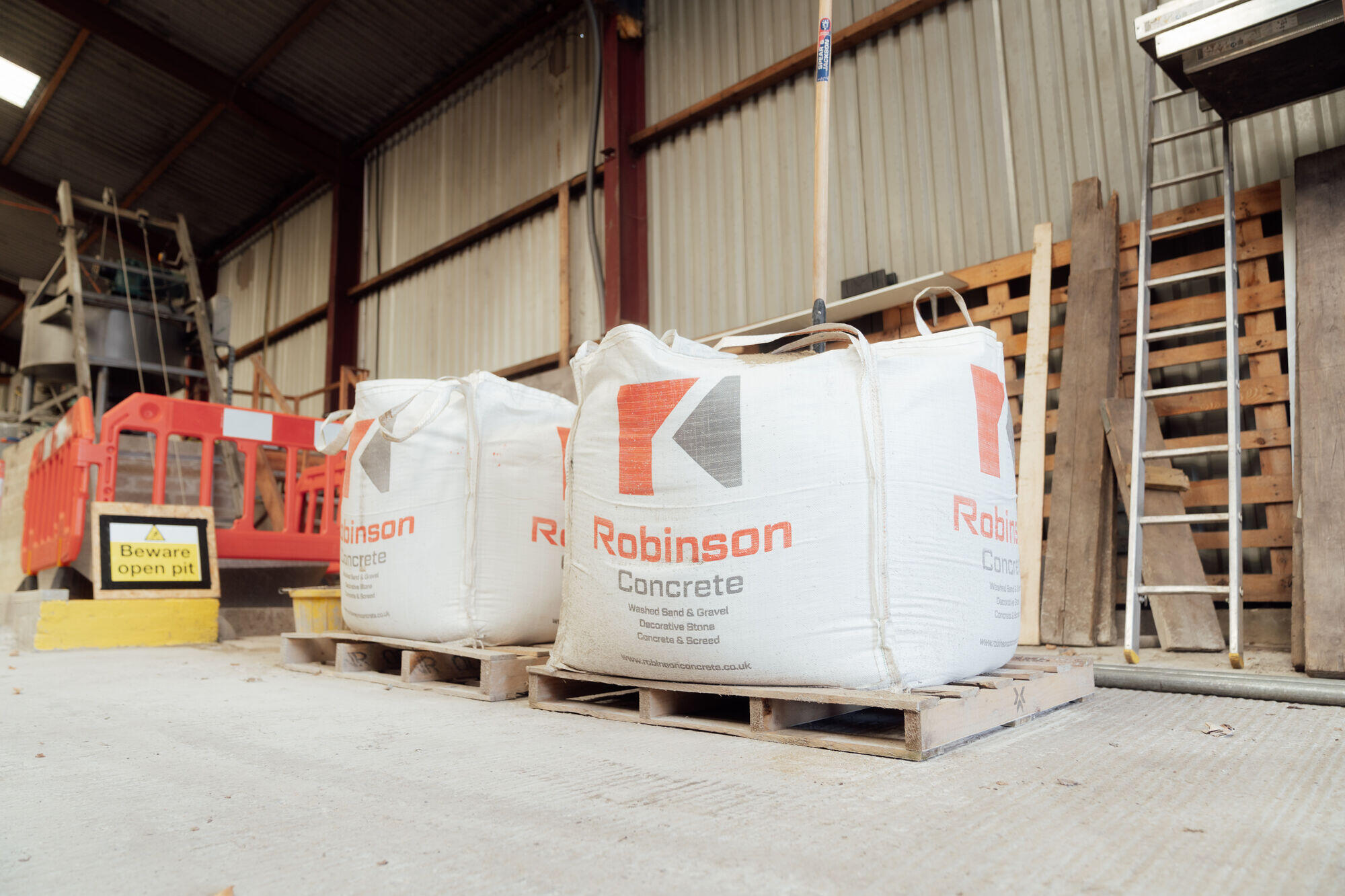 Bagged aggregate and concrete materials at the yard